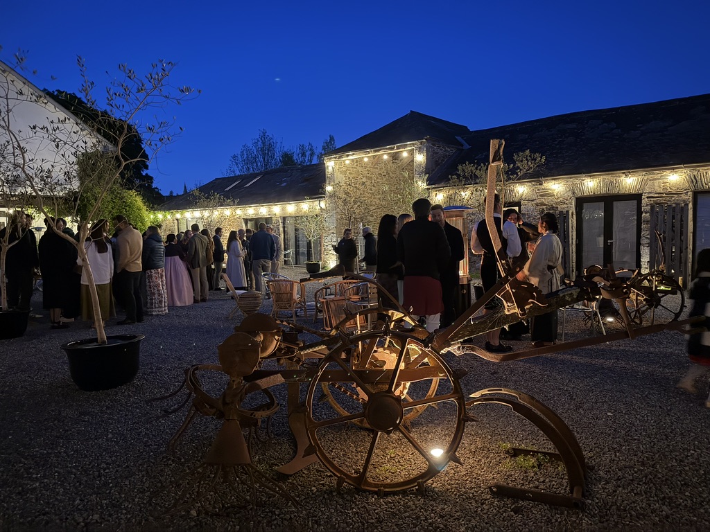 Guests gathered in the illuminated ANRÁN courtyard